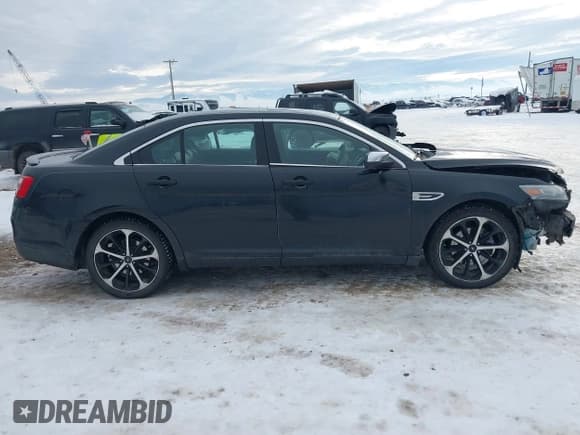 ✅ 2014 Ford Taurus Limited • VIN: 1FAHP2J88EG109972 • Lot: 41310254. Listed on IAAI with 143,757 mi. Free auction sales archive from the USA and detailed vehicle history report at DreamBid. Image 14.