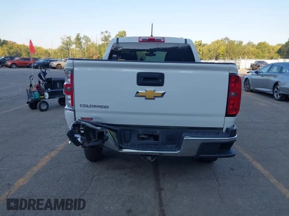 ✅ 2020 Chevrolet Colorado 2WD Work Truck • VIN: 1GCGSBEA7L1186415 • Lot: 43201106. Listed on IAAI with 131,939 mi. Free auction sales archive from the USA and detailed vehicle history report at DreamBid. Image 16.