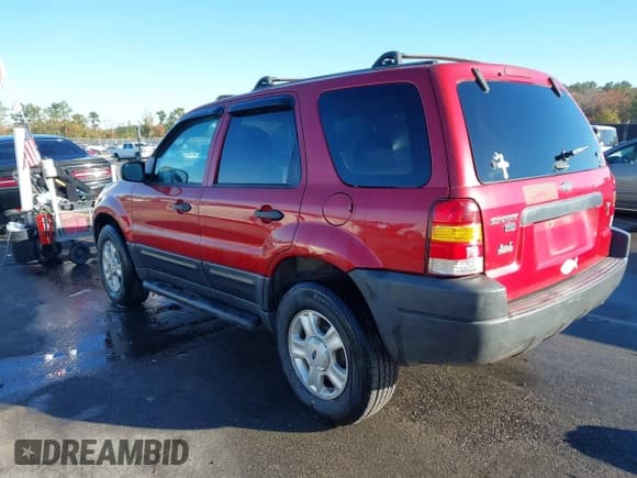 ✅ 2003 Ford Escape XLT Popular • VIN: 1FMYU03113KA71045 • Lot: 43720263. Listed on IAAI with 193,412 mi. Free auction sales archive from the USA and detailed vehicle history report at DreamBid. Image 3.