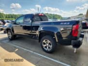✅ 2015 Chevrolet Colorado 2WD Z71 • VIN: 1GCHSCE31F1175037 • Лот: 61641745. Опубликован ранее на Copart с пробегом 93 310 миль. Бесплатный доступ к архиву аукционных продаж из США и подробный отчёт об истории автомобиля на DreamBid. Изображение 2.