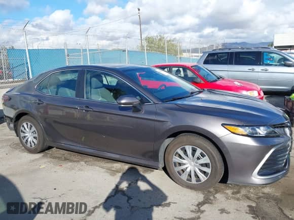 2023 Toyota Camry Hybrid LE z VIN 4T1C31AKXPU611291, wystawiony jako IAAI lot #43454380 z przebiegiem 48 339 mil mil oraz . Historia ofert i sprzedaży dostępna na DreamBid. Obrazek 13.