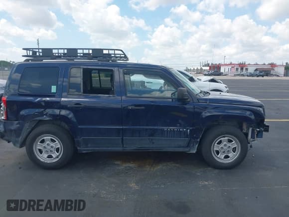 ✅ 2016 Jeep Patriot Sport SE • VIN: 1C4NJPBA2GD731551 • Lot: 42337093. Listed on IAAI with 124,902 mi. Free auction sales archive from the USA and detailed vehicle history report at DreamBid. Image 13.