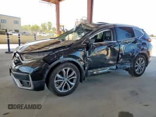 ✅ 2021 Honda CR-V Touring • VIN: 2HKRW1H99MH410772 • Lot: 71300285. Listed on Copart with Not provided. Free auction sales archive from the USA and detailed vehicle history report at DreamBid. Image 1.