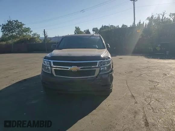 ✅ 2015 Chevrolet Suburban LT • VIN: 1GNSCJKC2FR238845 • Lot: 82429885. Listed on Copart with 65,404 mi. Free auction sales archive from the USA and detailed vehicle history report at DreamBid. Image 14.