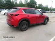 ✅ 2021 Mazda CX-5 Touring • VIN: JM3KFBCMXM1303358 • Lot: 42829675. Wystawiony na IAAI z przebiegiem 53 848 mil. Bezpłatny archiwum sprzedaży aukcyjnych z USA i szczegółowy raport historii pojazdu na DreamBid. Zdjęcie 4.
