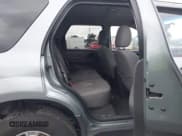 ✅ 2006 Ford Escape XLT • VIN: 1FMYU93176KB66332 • Lot: 43896595. Listed on IAAI with 150,508 mi. Free auction sales archive from the USA and detailed vehicle history report at DreamBid. Image 8.