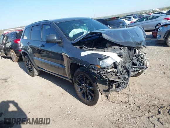 ✅ 2018 Jeep Grand Cherokee Laredo E • VIN: 1C4RJEAGXJC124726 • Lot: 41990741. Listed on IAAI with 112,217 mi. Free auction sales archive from the USA and detailed vehicle history report at DreamBid. Image 1.