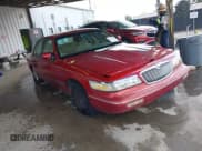 ✅ 1997 Mercury Grand Marquis GS • VIN: 2MELM74W0VX665187 • Lot: 43311356. Wystawiony na IAAI z przebiegiem 94 786 mil. Bezpłatny archiwum sprzedaży aukcyjnych z USA i szczegółowy raport historii pojazdu na DreamBid. Zdjęcie 1.