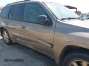 ✅ 2002 GMC Envoy SLT • VIN: 1GKDT13S122527150 • Лот: 42709149. Опубликован ранее на IAAI с пробегом 225 552 миль. Бесплатный доступ к архиву аукционных продаж из США и подробный отчёт об истории автомобиля на DreamBid. Изображение 6.