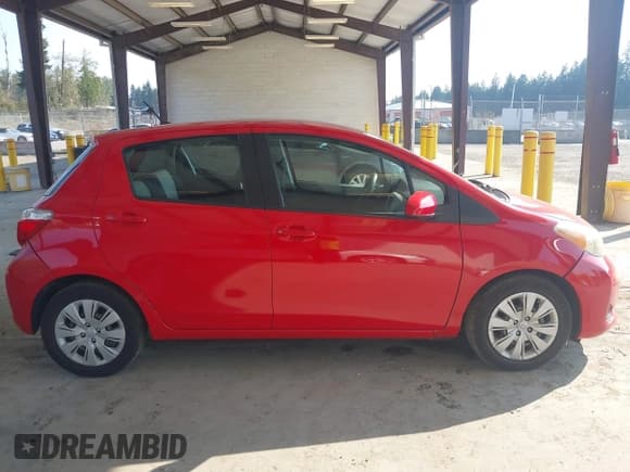 ✅ 2012 Toyota Yaris L • VIN: JTDKTUD35CD514192 • Lot: 43118141. Listed on IAAI with 98,508 mi. Free auction sales archive from the USA and detailed vehicle history report at DreamBid. Image 14.