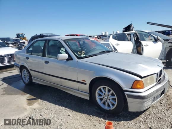 1998 BMW 3 Series 328i z VIN WBACD4326WAV64466, wystawiony jako Copart lot #74957534 z przebiegiem 152 963 mil mil oraz Szkoda całkowita • Salvage title. Historia ofert i sprzedaży dostępna na DreamBid. Obrazek 4.