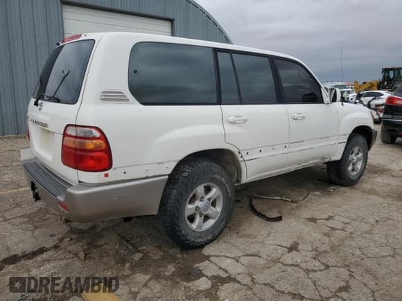 ✅ 1999 Toyota Land Cruiser • VIN: JT3HT05JXX0049250 • Lot: 80630194. Listed on Copart with 348,940 mi. Free auction sales archive from the USA and detailed vehicle history report at DreamBid. Image 3.