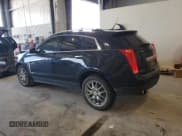 ✅ 2014 Cadillac SRX Premium Collection • VIN: 3GYFNGE35ES642473 • Lot: 69027175. Wystawiony na Copart z przebiegiem 109 499 mil. Bezpłatny archiwum sprzedaży aukcyjnych z USA i szczegółowy raport historii pojazdu na DreamBid. Zdjęcie 2.