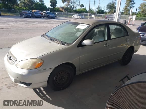 ✅ 2004 Toyota Corolla LE • VIN: JTDBR32E042043904 • Lot: 43665093. Listed on IAAI with 206,538 mi. Free auction sales archive from the USA and detailed vehicle history report at DreamBid. Image 2.