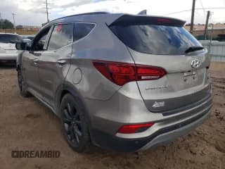 ✅ 2018 Hyundai Santa Fe Ultimate • VIN: 5NMZWDLA3JH103285 • Лот: 61269632. Опубликован ранее на Copart с пробегом Не указан. Бесплатный доступ к архиву аукционных продаж из США и подробный отчёт об истории автомобиля на DreamBid. Изображение 3.