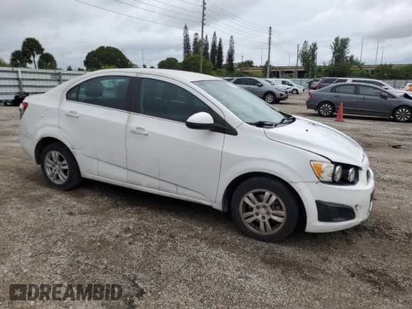 2013 Chevrolet Sonic LT с VIN 1G1JC5SH4D4170347, выставлен на аукционе Copart как лот 74256254 с пробегом 159 914 миль миль и Списание • Salvage title. История ставок и продаж доступна на DreamBid. Изображение 4.