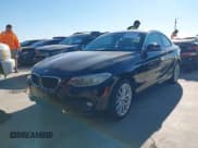 ✅ 2014 BMW 2 Series 228i • VIN: WBA1F5C59EVV99592 • Lot: 43673726. Listed on IAAI with 130,778 mi. Free auction sales archive from the USA and detailed vehicle history report at DreamBid. Image 2.