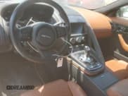 ✅ 2021 Jaguar F-Type P300 • VIN: SAJDD5GX0MCK75010 • Lot: 66995115. Wystawiony na Copart z przebiegiem 57 637 mil. Bezpłatny archiwum sprzedaży aukcyjnych z USA i szczegółowy raport historii pojazdu na DreamBid. Zdjęcie 8.