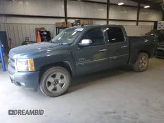 2009 Chevrolet Silverado 1500 LT with VIN 3GCEC23J29G253066, listed as a Copart auction lot 62371525 with 194,463 mi miles and Salvage title. Bid and sale history available at DreamBid. Image 1.
