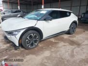 ✅ 2024 Kia EV6 Wind • VIN: KNDC34LA2R5176886 • Lot: 42124366. Wystawiony na IAAI z przebiegiem 36 094 mil. Bezpłatny archiwum sprzedaży aukcyjnych z USA i szczegółowy raport historii pojazdu na DreamBid. Zdjęcie 18.