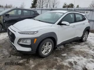 ✅ 2021 Hyundai Kona SE • VIN: KM8K12AA3MU656339 • Лот: 38604784. Опубликован ранее на Copart с пробегом 106 253 миль. Бесплатный доступ к архиву аукционных продаж из США и подробный отчёт об истории автомобиля на DreamBid. Изображение 1.