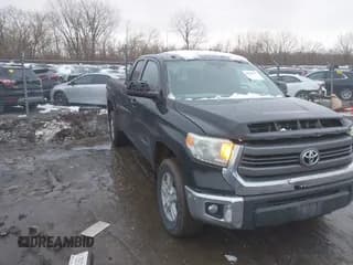 ✅ 2014 Toyota Tundra SR • VIN: 5TFUM5F1XEX052687 • Lot: 43888717. Listed on IAAI with 217,126 mi. Free auction sales archive from the USA and detailed vehicle history report at DreamBid. Image 1.