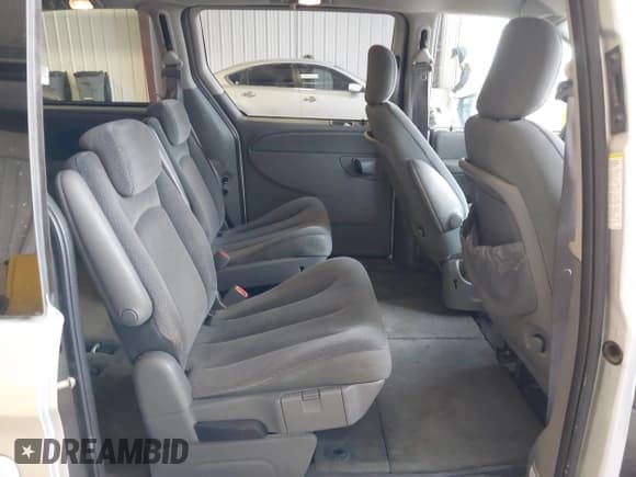 ✅ 2005 Dodge Caravan SXT • VIN: 2D4GP44L15R459026 • Lot: 43711842. Listed on IAAI with 203,644 mi. Free auction sales archive from the USA and detailed vehicle history report at DreamBid. Image 8.