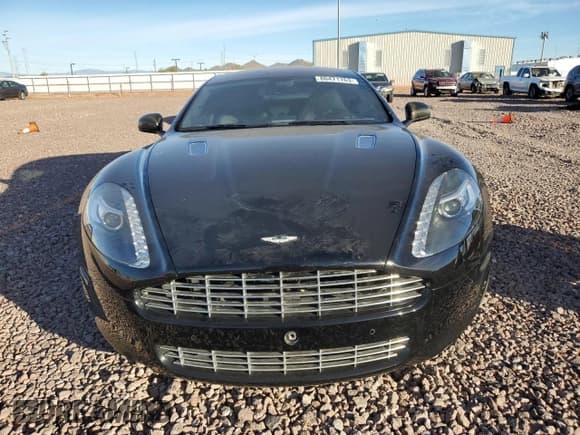 ✅ 2012 Aston Martin Rapide • VIN: SCFHDDAJ7CAF02268 • Lot: 80471763. Wystawiony na Copart z przebiegiem 42 790 mil. Bezpłatny archiwum sprzedaży aukcyjnych z USA i szczegółowy raport historii pojazdu na DreamBid. Zdjęcie 5.