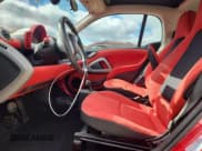 ✅ 2015 Smart fortwo Passion • VIN: WMEEJ9AA6FK834237 • Лот: 90071655. Опубликован ранее на Copart с пробегом Не указан. Бесплатный доступ к архиву аукционных продаж из США и подробный отчёт об истории автомобиля на DreamBid. Изображение 7.