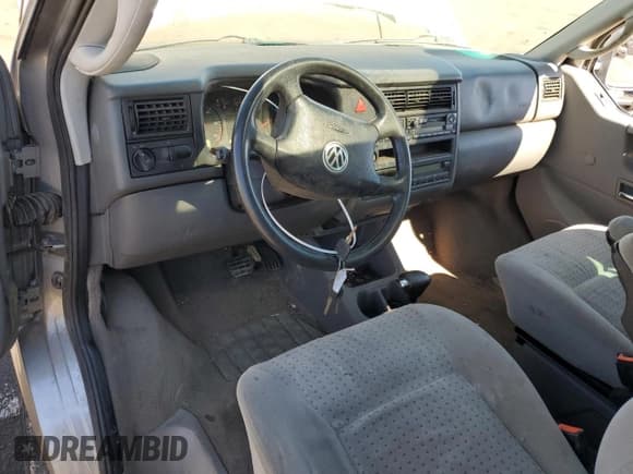 ✅ 2000 Volkswagen EuroVan • VIN: WV2MH4701YH133906 • Лот: 72370794. Опубликован ранее на Copart с пробегом Не указан. Бесплатный доступ к архиву аукционных продаж из США и подробный отчёт об истории автомобиля на DreamBid. Изображение 8.