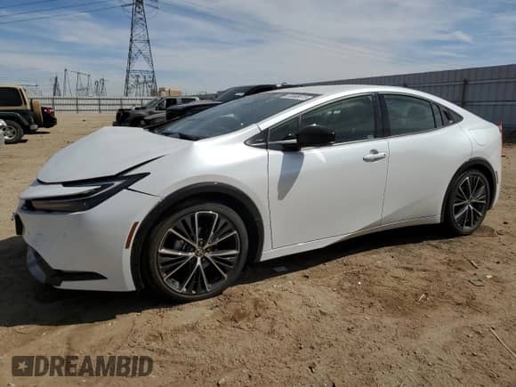 2024 Toyota Prius LE with VIN JTDACAAUXR3030010, listed as a Copart auction lot 69868615 with 22,790 mi miles and Salvage title. Bid and sale history available at DreamBid. Image 1.