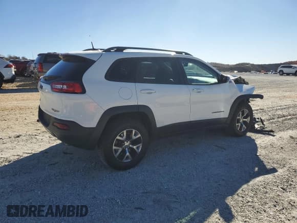 ✅ 2016 Jeep Cherokee Trailhawk • VIN: 1C4PJMBS8GW227719 • Lot: 93120535. Listed on Copart with 43,989 mi. Free auction sales archive from the USA and detailed vehicle history report at DreamBid. Image 3.
