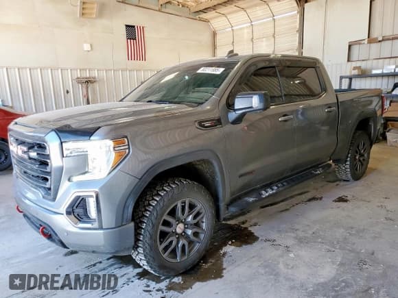 ✅ 2021 GMC Sierra 1500 AT4 • VIN: 1GTU9EET9MZ183844 • Лот: 80211985. Опубликован ранее на Copart с пробегом 86 980 миль. Бесплатный доступ к архиву аукционных продаж из США и подробный отчёт об истории автомобиля на DreamBid. Изображение 1.