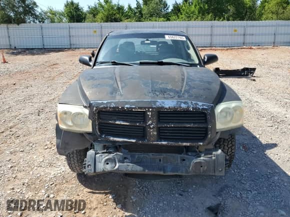 2005 Dodge Dakota SLT z VIN 1D7HE48N85S271093, wystawiony jako Copart lot #65622765 z przebiegiem 157 344 mil mil oraz Szkoda całkowita • Salvage title. Historia ofert i sprzedaży dostępna na DreamBid. Obrazek 5.