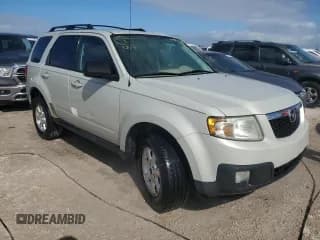 ✅ 2009 Mazda Tribute Sport • VIN: 4F2CZ027X9KM01666 • Лот: 80902224. Опубликован ранее на Copart с пробегом Не указан. Бесплатный доступ к архиву аукционных продаж из США и подробный отчёт об истории автомобиля на DreamBid. Изображение 4.