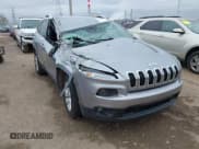 ✅ 2014 Jeep Cherokee Latitude • VIN: 1C4PJLCS0EW101599 • Lot: 43559434. Listed on IAAI with 129,767 mi. Free auction sales archive from the USA and detailed vehicle history report at DreamBid. Image 1.