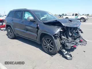 2017 Jeep Grand Cherokee Trailhawk with VIN 1C4RJFLG7HC654259, listed as a IAAI auction lot 42510197 with 103,947 mi miles and . Bid and sale history available at DreamBid. Image 1.