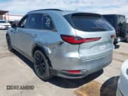 ✅ 2025 Mazda CX-90 Premium Sport • VIN: JM3KKCHD5S1229127 • Lot: 42867028. Listed on IAAI with 2,636 mi. Free auction sales archive from the USA and detailed vehicle history report at DreamBid. Image 3.