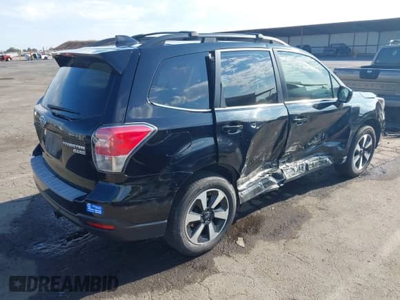 2017 Subaru Forester Limited with VIN JF2SJARC0HH803155, listed as a IAAI auction lot 43085830 with 101,984 mi miles and . Bid and sale history available at DreamBid. Image 4.