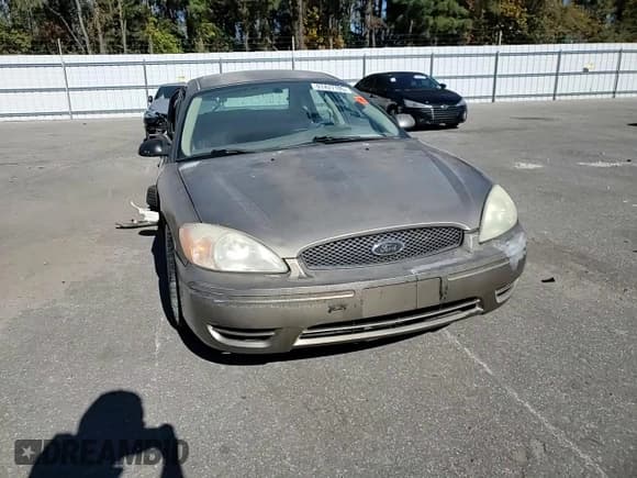✅ 2004 Ford Taurus SE • VIN: 1FAFP53U94A103330 • Lot: 91427105. Listed on Copart with Not provided. Free auction sales archive from the USA and detailed vehicle history report at DreamBid. Image 13.