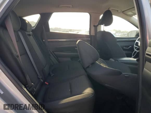 2023 Hyundai Tucson Blue z VIN KM8JBCA18PU123471, wystawiony jako Copart lot #85730945 z przebiegiem 29 261 mil mil oraz Szkoda całkowita • Salvage title. Historia ofert i sprzedaży dostępna na DreamBid. Obrazek 11.