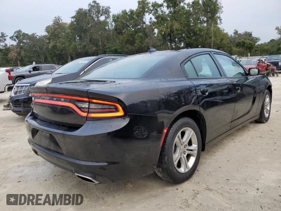 ✅ 2023 Dodge Charger SXT • VIN: 2C3CDXBG5PH663238 • Lot: 90501795. Wystawiony na Copart z przebiegiem 50 017 mil. Bezpłatny archiwum sprzedaży aukcyjnych z USA i szczegółowy raport historii pojazdu na DreamBid. Zdjęcie 3.