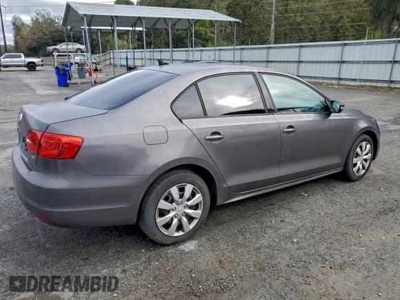 ✅ 2014 Volkswagen Jetta SE • VIN: 3VWD17AJ6EM278840 • Lot: 94990005. Listed on Copart with 198,476 mi. Free auction sales archive from the USA and detailed vehicle history report at DreamBid. Image 3.