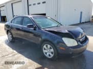 ✅ 2006 Kia Optima LX • VIN: KNAGE123565062354 • Лот: 52039425. Опубликован ранее на Copart с пробегом 252 137 миль. Бесплатный доступ к архиву аукционных продаж из США и подробный отчёт об истории автомобиля на DreamBid. Изображение 4.