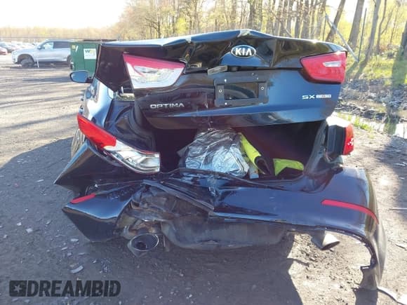 ✅ 2014 Kia Optima SXL Turbo • VIN: 5XXGR4A65EG297352 • Лот: 42151539. Опубликован ранее на IAAI с пробегом 112 496 миль. Бесплатный доступ к архиву аукционных продаж из США и подробный отчёт об истории автомобиля на DreamBid. Изображение 12.