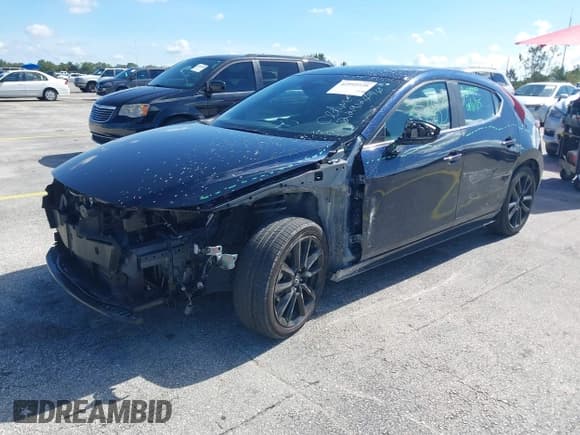 ✅ 2025 Mazda 3 S Select Sport • VIN: JM1BPAKM8S1753783 • Lot: 42992528. Listed on IAAI with 24,179 mi. Free auction sales archive from the USA and detailed vehicle history report at DreamBid. Image 2.