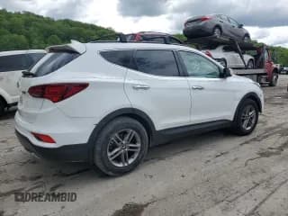 ✅ 2018 Hyundai Santa Fe 2.4L • VIN: 5XYZU3LB0JG535142 • Лот: 54586104. Опубликован ранее на Copart с пробегом 58 661 миль. Бесплатный доступ к архиву аукционных продаж из США и подробный отчёт об истории автомобиля на DreamBid. Изображение 3.