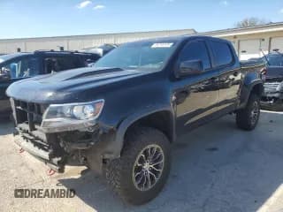 ✅ 2022 Chevrolet Colorado 4WD ZR2 • VIN: 1GCGTEEN0N1285744 • Лот: 86269105. Опубликован ранее на Copart с пробегом 40 857 миль. Бесплатный доступ к архиву аукционных продаж из США и подробный отчёт об истории автомобиля на DreamBid. Изображение 1.
