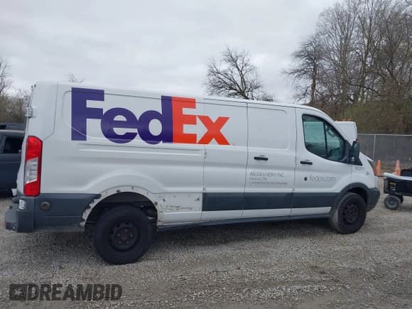 ✅ 2015 Ford Transit Cargo • VIN: 1FTYR2ZM4FKA94360 • Lot: 41931202. Listed on IAAI with 324,881 mi. Free auction sales archive from the USA and detailed vehicle history report at DreamBid. Image 13.