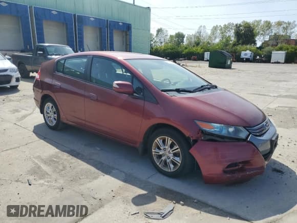 ✅ 2010 Honda Insight EX • VIN: JHMZE2H7XAS032061 • Лот: 71234224. Опубликован ранее на Copart с пробегом 214 788 миль. Бесплатный доступ к архиву аукционных продаж из США и подробный отчёт об истории автомобиля на DreamBid. Изображение 4.